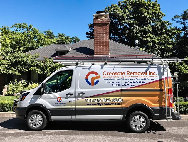 Georgetown Chimney Sweep technician removing creosote safely in Georgetown, GA