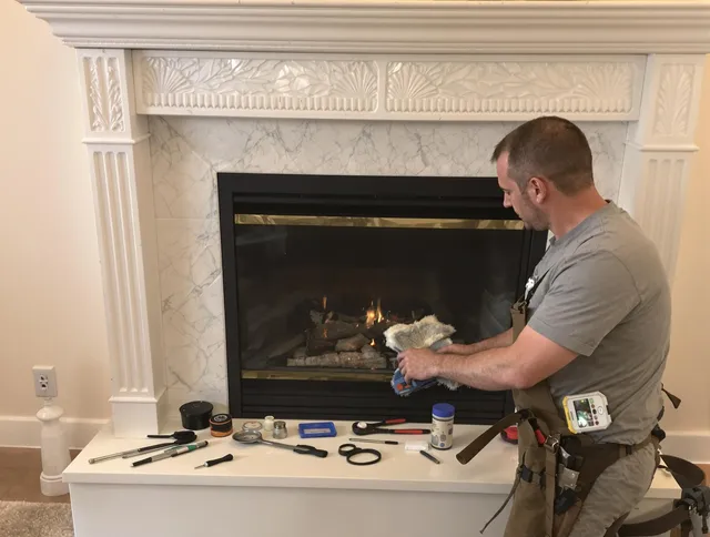 Georgetown Chimney Sweep performing fireplace maintenance in Georgetown, GA